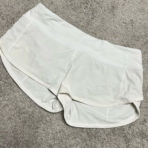 White LULULEMON athletic shorts